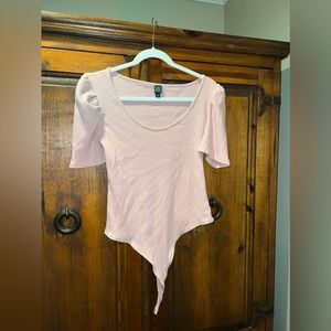 Pale pink body suit